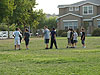 Tyler playing football with his friends from the team