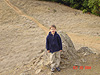 Tyler by a rock