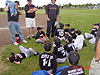 Coach Jimmy talking to the team after the game