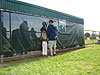 Jordan and Ken talking to Tyler in the dugout