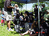 Woody handing out pictures and batting averages to the kids
