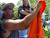 Ken holding up his new shirt
