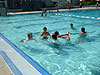 Tyler and his teammates swimming