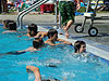 Tyler swimming with his friends