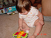 Jordan playing with her new bee toy