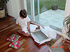Tyler checking out the presents inside the box