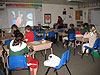 The kids watching a movie