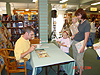 Kelly having her book signed