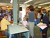 Mrs. Solheim getting her copy of Mo Willem's book signed