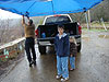 Ken setting up the EZ-Up with the kids
