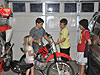 The boys looking at Tyler's bike before leaving for the dance
