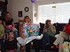 Opening more of her presents