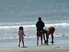 Jordan, Ken, and Tyler playing in the water