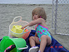 Jordan getting out her sand toys