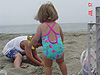 Jordan watching Tyler play in the sand