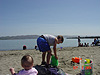 Jordan watching Tyler play in the sand
