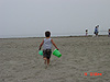 Tyler running down to help with the sandcastle