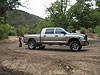 Tyler loading his gun in the truck