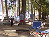 Tyler watching Ken and Dave play horseshoes