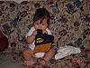 Jordan chewing on Daddy's hat