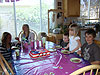 The kids getting ready to eat cake