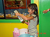 Katie opening up a gift from Kyra