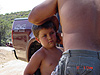Ken putting in Tyler's earplugs