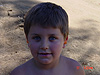 Tyler with his earplugs in