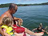 Ken and Jordan watching Tyler swim
