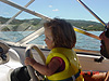 Another picture of Jordan driving the boat