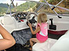 Jordan driving the boat slowly