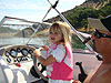 Jordan driving the boat
