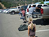 Jordan watching Ken and Tyler unload stuff for the lake