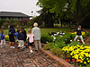 The kids looking at the flowers