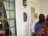 The guide opening the house