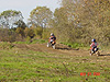 Tyler and Riley riding around the track