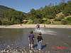 Tyler and Destry watching John go through the creek