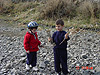 Tyler showing Destry his stick collection