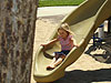 Jordan going down a slide