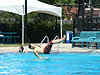 The kids jumping off the diving board