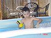 Tyler cooling off in the pool after Scandia