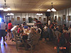 The party guests all sitting down for some yummy food and cake