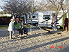 The kids playing at the campsite playground