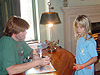 Makala having her book signed