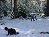 Tyler and Ken making snowballs