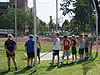 The kids waiting to do the softball throw