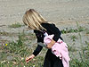 Jordan picking flowers