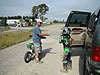 Ken helping Tyler get his bike off the Excursion