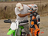 Ken helping Tyler with his helmet