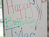 The sign for Tyler's party